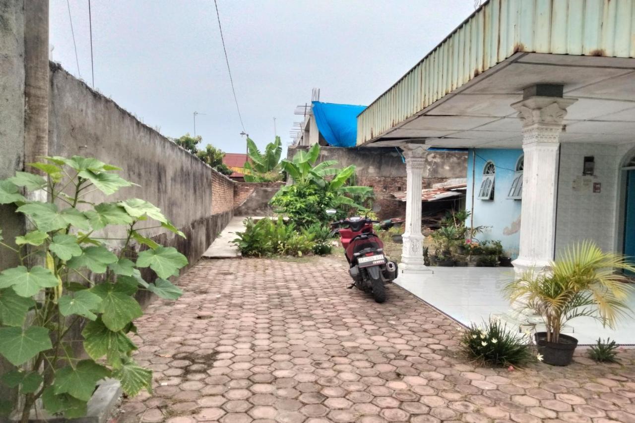 Spot On 93104 Barak Tambunan Nearbelawan Port ميدان المظهر الخارجي الصورة